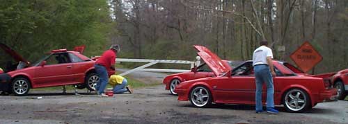 A rare pic of three Red SCs on the side of the road....